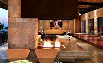 Exotic-Open-Fireplace-Living-Room-Design-with-Natural-Stone-and-Fireplace-from-C.Ware-Inc